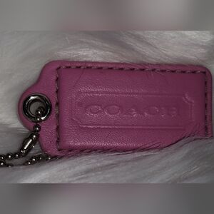 0023. 3 for $75 - Pre-loved authentic pink coach hang tag